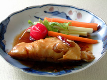 Photo of Halibut Nitsuke (a typical Japanese seafood dish): a quick microwave seafood recipe provided with nutrition facts for halibut, bluefish, or cod