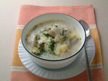 Image of Cod & Potato Cream Soup: a quick microwave soup recipe provided with nutrition facts for a seafood  dinner soup bowl.