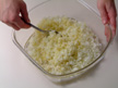 Image of mixing onion, garlic and olive oil.