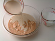 Image of combining chicken gumbo soup, evaporated milk, and low-fat milk.