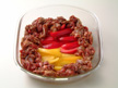 Image of beef and bell peppers placed ready for microwave cooking.