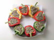 Image of stuffed bell peppers made ready for microwave cooking.