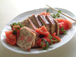 Image of Meat Loaf with Tomato Salad: a quick microwave meat recipe provided with nutrition facts for a pork entree.