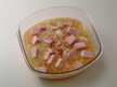 Photo of rice, ham and onion made ready for microwave cooking.