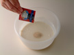 Image of adding yeast into the mixture.
