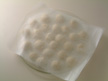 Image of the balls made ready for microwave cooking.