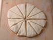 Image of wedge-shaped pieces of bread dough.