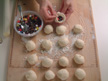 Image of dough balls with jellybeans, chocolate chips and sweet tarts inside.