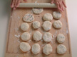 Image of flatting the dough balls.